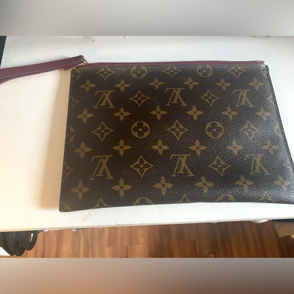 LV monogram canvas pochette wristlet. AUTHENTIC